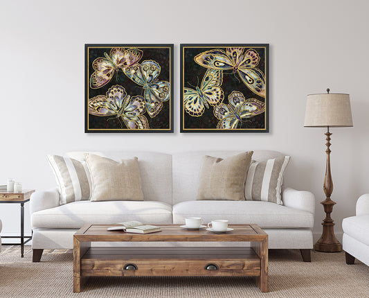 A diptych made up of Papillon Noir I and II prints hung above a sofa in a modern farmhouse style living room.